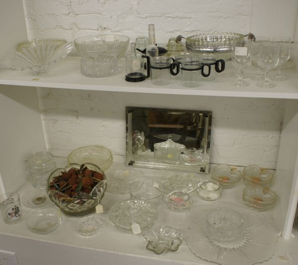 Mixed Lot / 2 Shelves Assorted Clear Glass Items: Mixed Lot / 2 Shelves Assorted Clear Glass Items. Buyer's Responsibility: All items must be paid the day of purchase and removed from the premises no later than 5 p.m. Monday, June 27.Or items may be