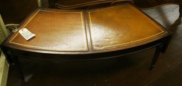 Mahogany Drop Leaf CoffeTable Leather Top: Mahogany Drop Leaf CoffeTable Leather Top. Buyer's Responsibility: All items must be paid the day of purchase and removed from the premises no later than 5 p.m. Monday, June 27.Or items may be picked 