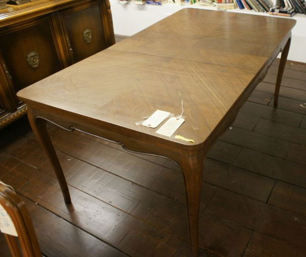 Country French Walnut Dining Table: Country French Walnut Dining Table. Buyer's Responsibility: All items must be paid the day of purchase and removed from the premises no later than 5 p.m. Monday, June 27. Or items may be picked up Sat