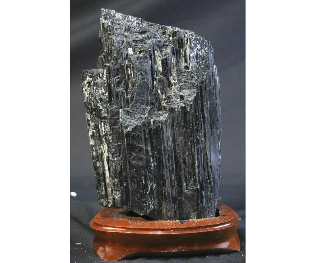 LARGE BLACK TOURMALINE SPECIMEN ON WOOD STAND (1 of 3)