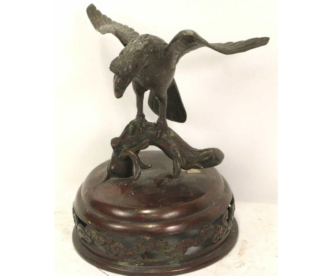 19th CENTURY JAPANESE FALCON BRONZE SCULPTURE: 19th CENTURY JAPANESE FALCON BRONZE SCULPTURE. WAS THE LID FOR A TEMPLE JAR. Height: 8.5 in. by Width: 7 in. by Depth: 6 in.