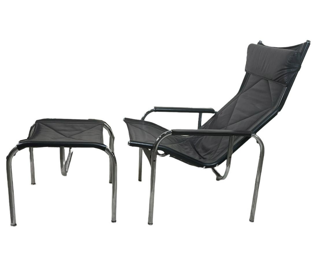 HANS EICHENBERGER LEATHER LOUNGE CHAIR AND OTTOMAN: VINTAGE HANS EICHENBERGER LEATHER LOUNGE CHAIR AND OTTOMAN. Height: 37 in. by Width: 24 in. by Depth: 27 in.
