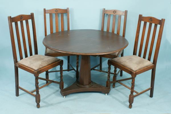 FOUR AMERICAN EMPIRE CHAIRS & TABLE, CIRCA 1840's: LOT OF FOUR ANTIQUE AMERICAN EMPIRE OAK BARLEY TWIST SIDE CHAIRS AND ROUND PEDESTAL FLIP-TOP DINING TABLE. CIRCA 1840's. Seat height 19 1/2 in. Height: 38 1/2 and 26 1/2 in. by Width: 18 1/2 and 40 1/