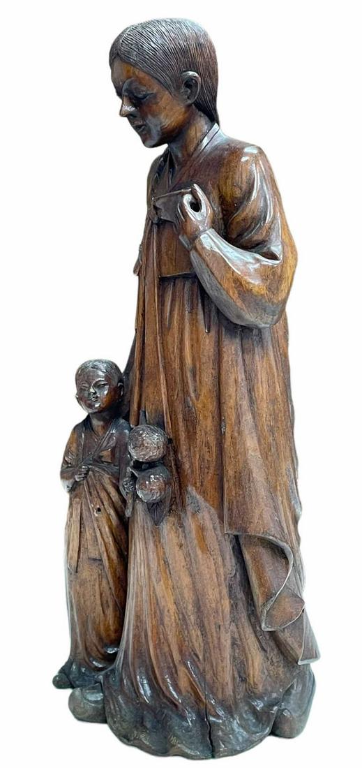 WOOD CARVED KOREAN MOTHER AND CHILD: WOOD CARVED KOREAN MOTHER AND CHILD Height: 20.5 in. by Width: 9 in. by Depth: 7.5 in.