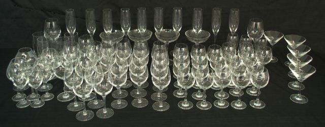 LOT OF 84-PIECES OF CRYSTAL STEMWARE: LOT OF EIGHTY-FOUR PIECES OF CRYSTAL STEMWARE. 25 Are Orrefors. Rest are mixed unmarked glassware 10 (10 1/2 IN.) CHAMPAGNE FLUTES, 5 (6 1/2 IN.) TALL GLASSES, 2 (8 1/4 IN.) RED WINE GOBLETS, 18 (7 1/