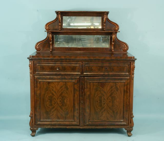 ANTIQUE EMPIRE SIDEBOARD WITH MIRROR BACKSPLASH: ANTIQUE MAHOGANY EMPIRE SIDEBOARD WITH TIERED MIRROR BACKSPLASH AND FLAME CROTCH GRAIN MAHOGANY PANELS. CIRCA 1830. Height: 62 1/2 in. by Width: 53 1/2 in. by Depth: 22 in.