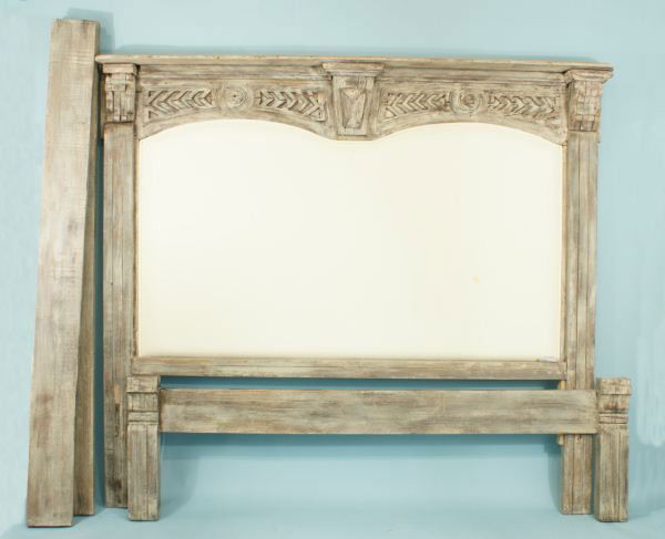 KING SIZE WOOD CARVED & DISTRESSED BED FRAME: KING SIZE WOOD CARVED & DISTRESSED BED FRAME WITH UPHOLSTERED HEADBOAD. REBUILT WITH ANTIQUE ELEMENTS. Height: 76 in. by Width: 83 1/2 in. by Depth: 7 1/4 in.