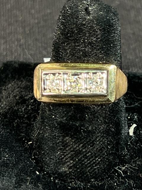 A DIAMOND CLUSTER SET IN A 10 KT YELLOW & WHITE (1 of 3)