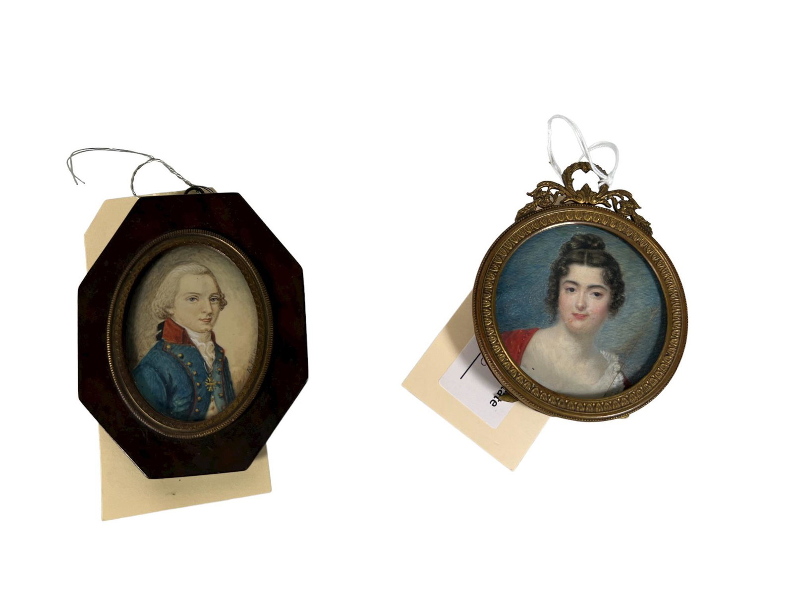 19TH C. 2 MINIATURE PORTRAITURES: 2 MINIATURE PORTRAITURES 1 MAN IN MILITARY UNIFORM A ND ONE OF A WOMAN Height: 3 in. by Width: 3