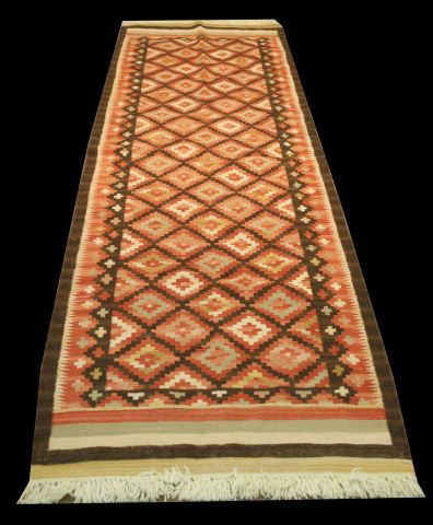 RUNNER WITH SMALL SQUARES AND BROWN EDGES: RUNNER WITH SMALL SQUARES AND BROWN EDGES. Height: 9 ft. 4 in. by Width: 2 ft. 9 in.