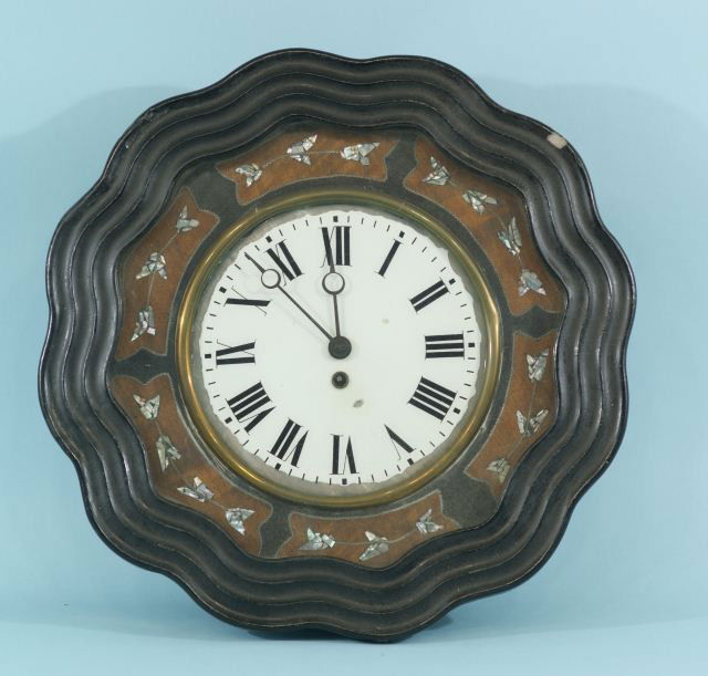 WALL CLOCK WITH MOTHER-OF-PEARL INLAY: WALL CLOCK WITH MOTHER-OF-PEARL INLAY WITH PENDULUM AND KEY. Height: 19 1/2 in. by Width: 19 1/2 in. by Depth: 5 1/2 IN
