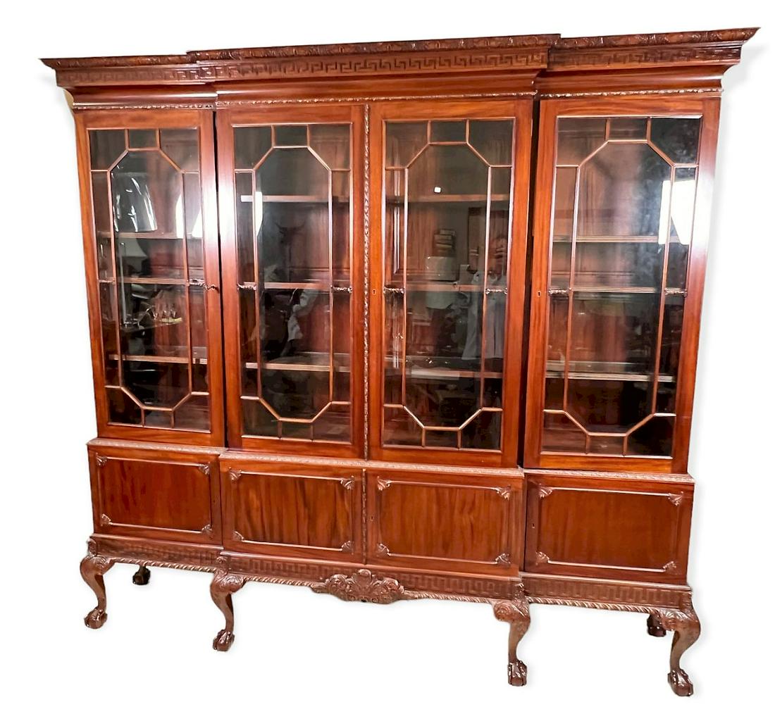 CHIPPENDALE MAHOGANY BREAKFRONT: CHIPPENDALE MAHOGANY BREAKFRONT ON BALL & CLAW FEET. FOUR DOORS OVER FOUR DOORS. Height: 87 in. by Width: 14 in. by Depth: 90 in.