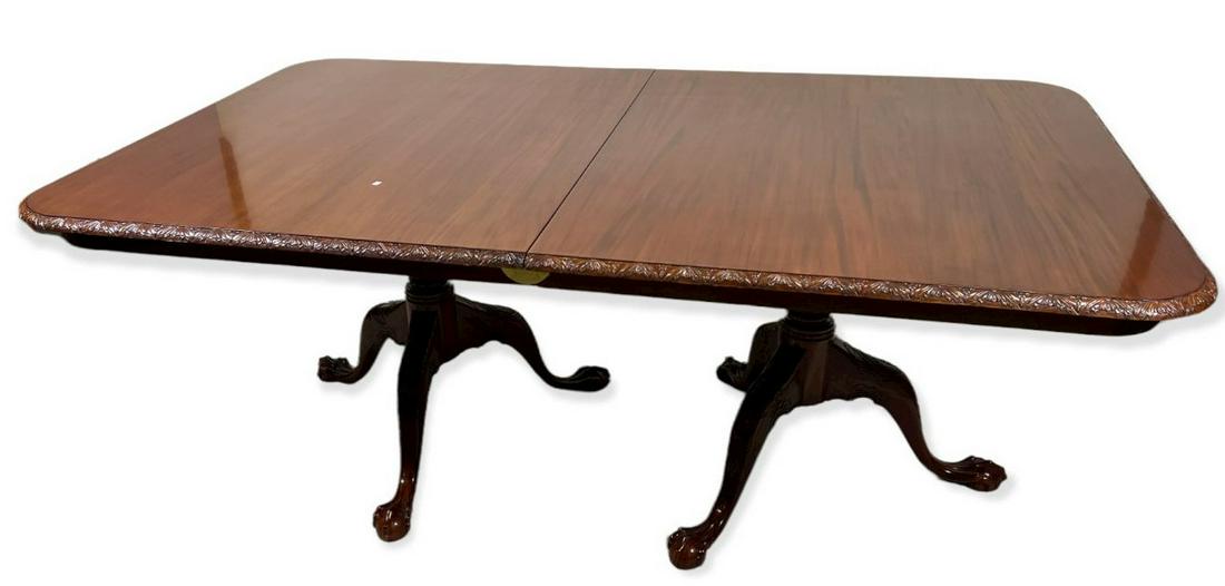 CHIPPENDALE DOUBLE PEDESTAL MAHOGANY TABLE: CHIPPENDALE DOUBLE PEDESTAL MAHOGANY TABLE ON BALL AND CLAW FEET. Height: 31 in. by Width: 48 in. by Depth: 115 in.