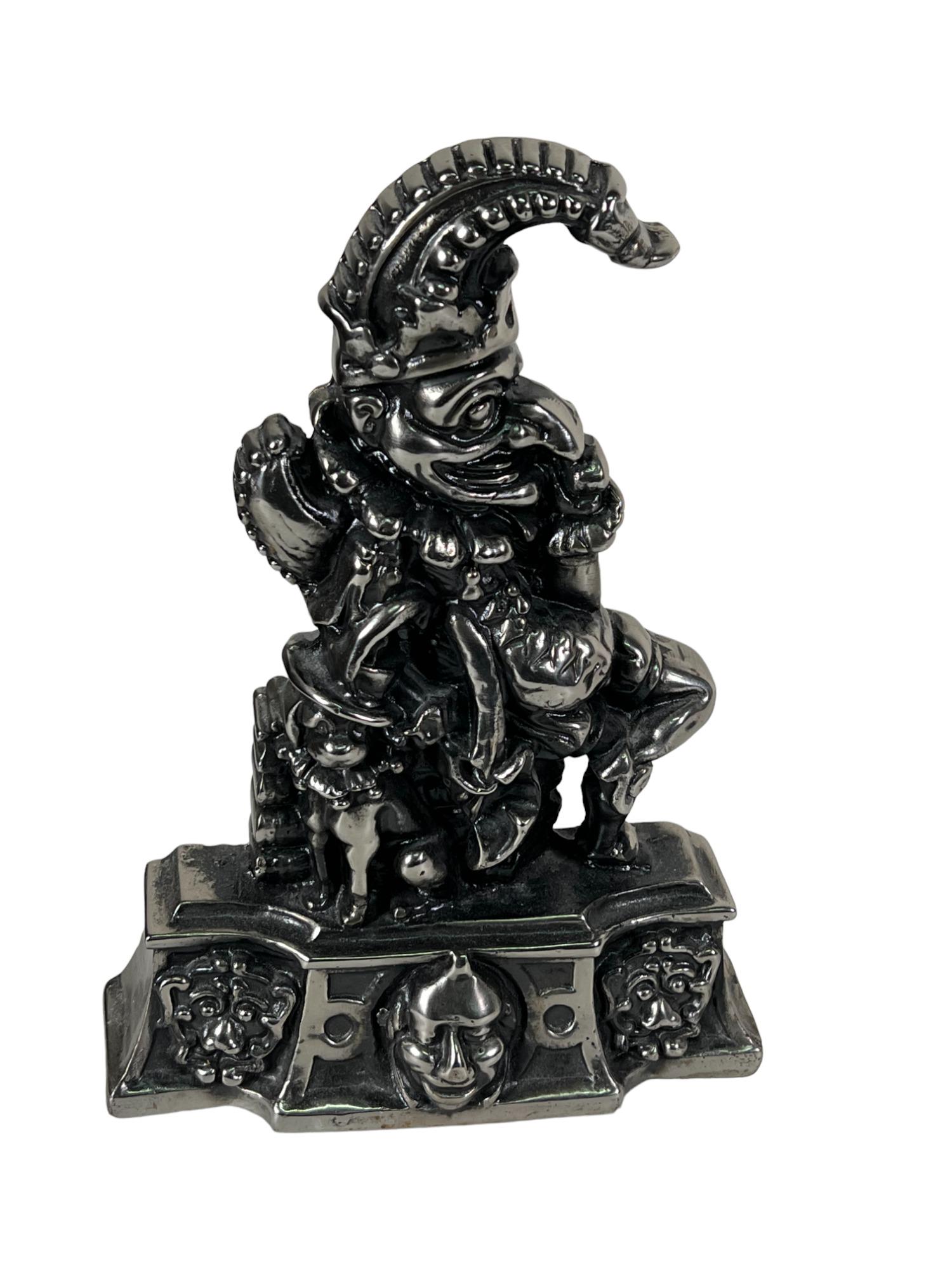 19TH C. CAST STEEL PUNCH DOORSTOP (1 of 2)