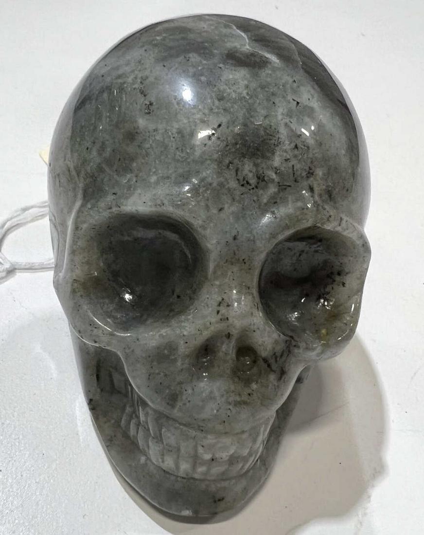 LABRADORITE SKULL: LABRADORITE SKULL. Height: 3 in. by Width: 3.5 in. by Depth: 2.5 in.