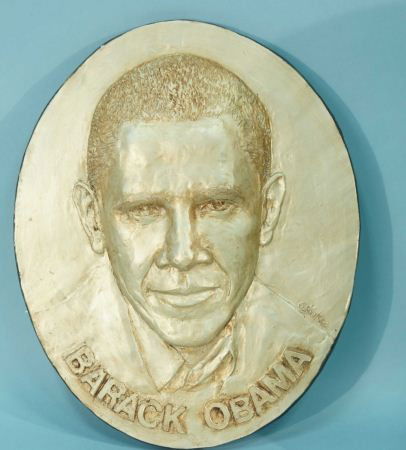 DAVID ADICKES "PRESIDENT BARACK OBAMA": DAVID ADICKES, GILDED PLASTER RELIEF OF "PRESIDENT BARACK OBAMA". Height: 13 in. by Width: 10 1/2 in. by Depth: 1 1/4 in.