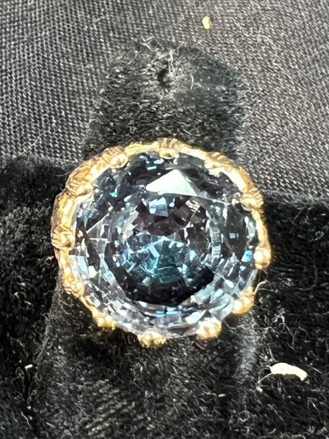A LONDON BLUE TOPAZ SET IN A NEW 14 KT YELLOW RING (1 of 2)