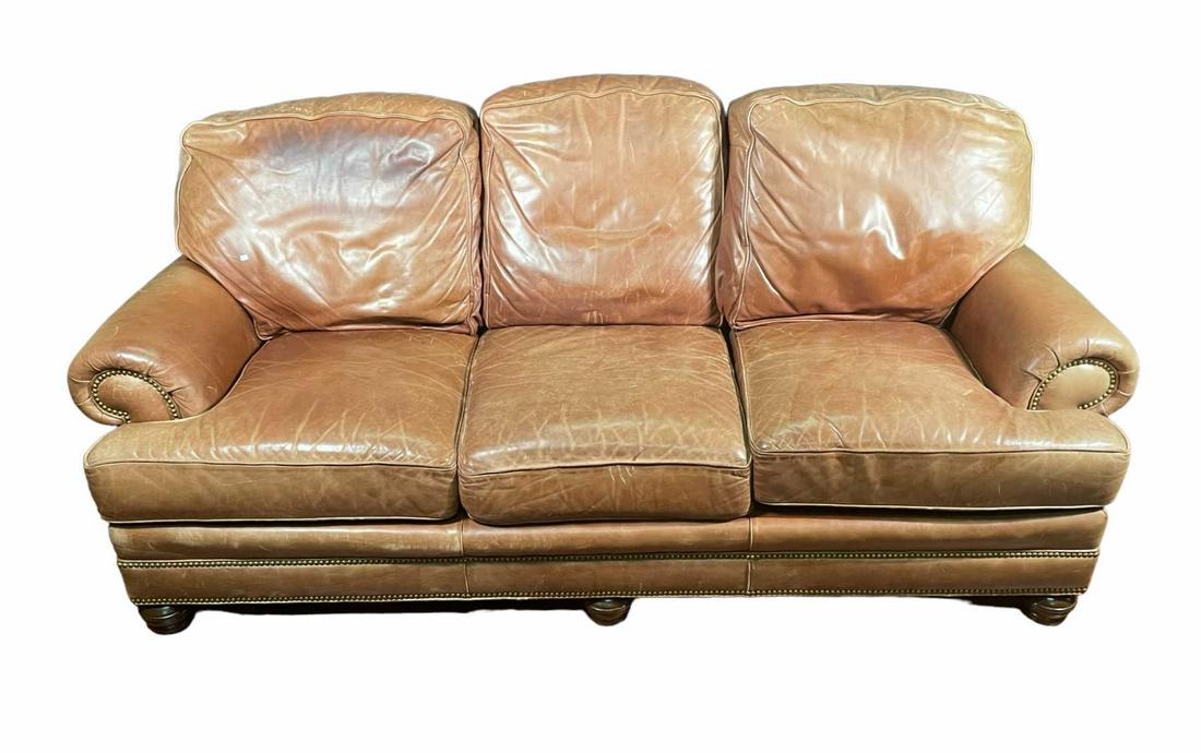 BROWN LEATHER SOFA: BROWN LEATHER SOFA. Height: 40 in. by Width: 88 in. by Depth: 46