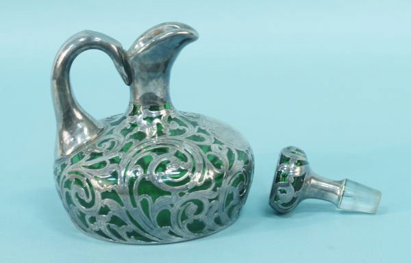 CUT GLASS WINE HOLDER WITH STERLING SILVER OVERLAY: CUT GLASS WINE HOLDER WITH STERLING SILVER OVERLAY. Height: 7 1/2 in. by Width: 7 in.