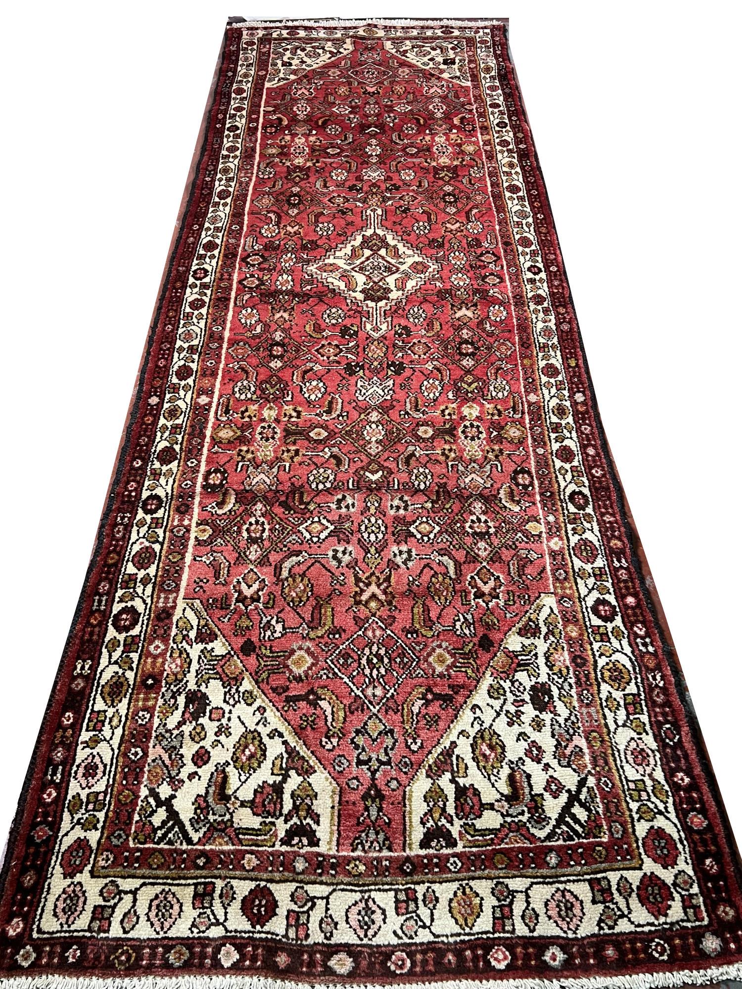 HAND KNOTTED HAMADAN RUNNER: HAND KNOTTED HAMADAN RUNNER. Height: 122 in. by Width: 40 in.