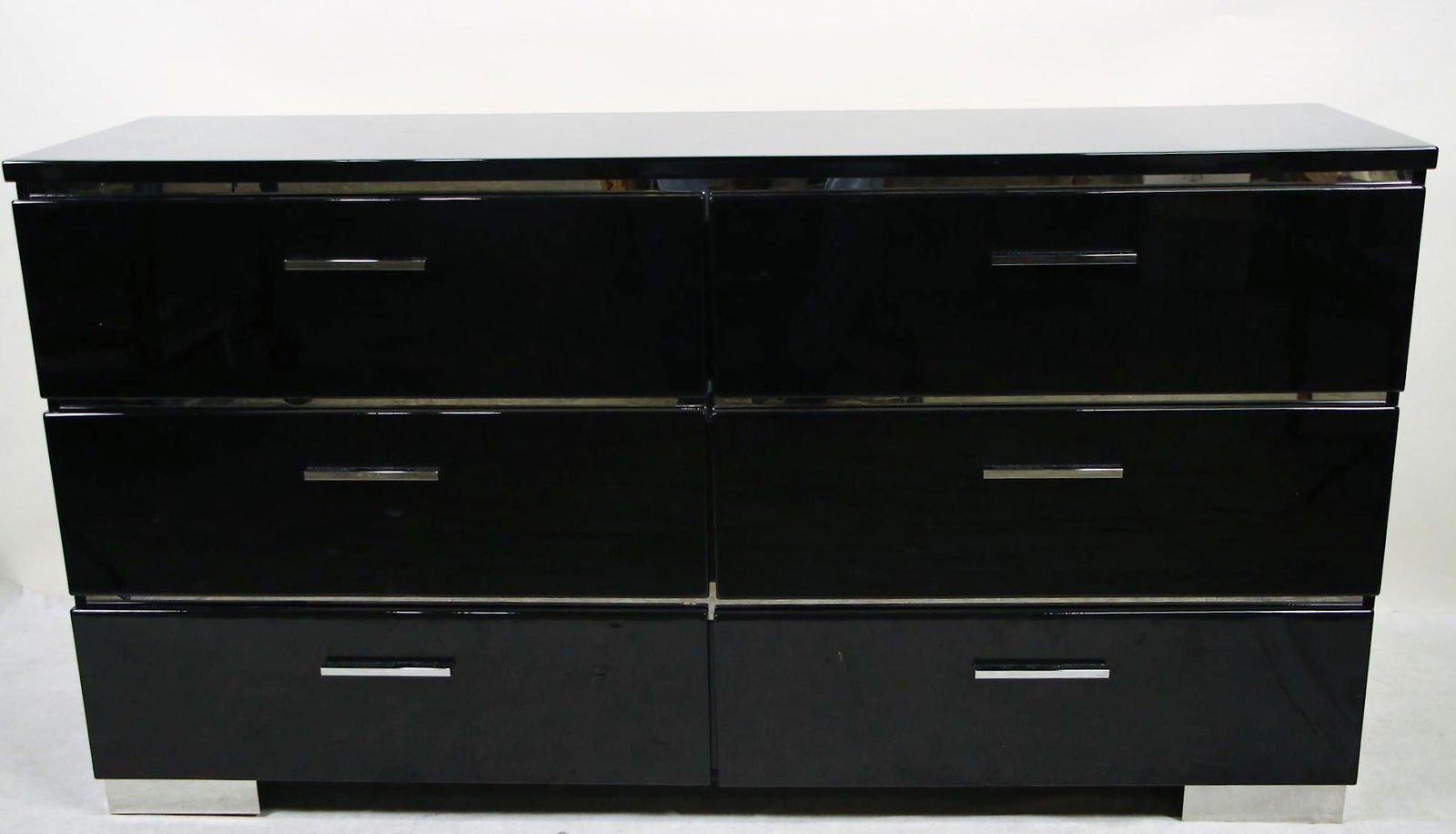 CONTEMPORARY EBONIZED DRESSER WITH SIX DRAWERS: CONTEMPORARY EBONIZED DRESSER WITH SIX DRAWERS. Height: 33 in. by Width: 63 in. by Depth: 17.75 in.