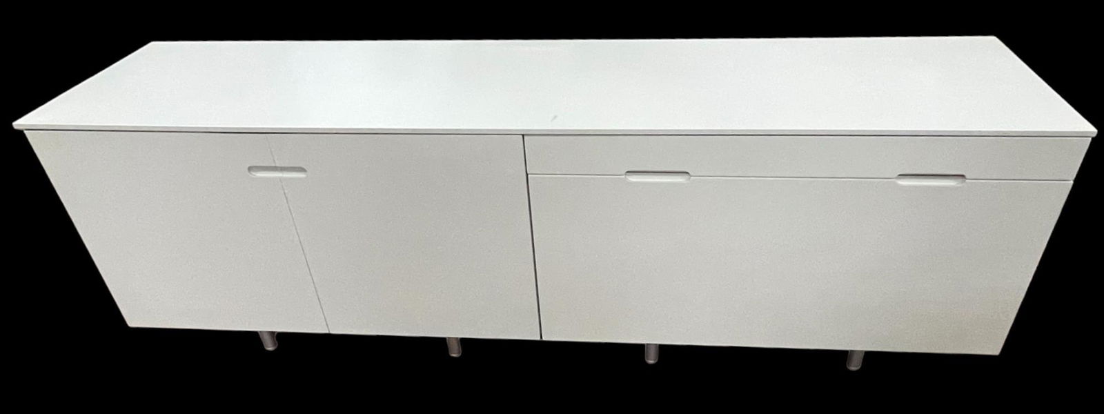 PAIR OF WHITE CABINETS/CREDENZAS: PAIR OF WHITE CABINETS/CREDENZAS. HAS TOP THAT CAN BE USED WITH THE TWO CABINETS OR THEY CAN BE 2 SEPARATE CABINETS. Height: 25.75 in. by Width: 76 in. by Depth: 19