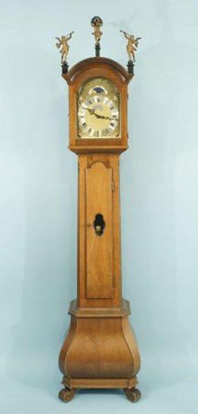 VINTAGE TALL CASE CLOCK BY WARMINK: VINTAGE TALL CASE CLOCK BY WARMINK. Height: 83 in. by Width: 20 in. by Depth: 12 in.
