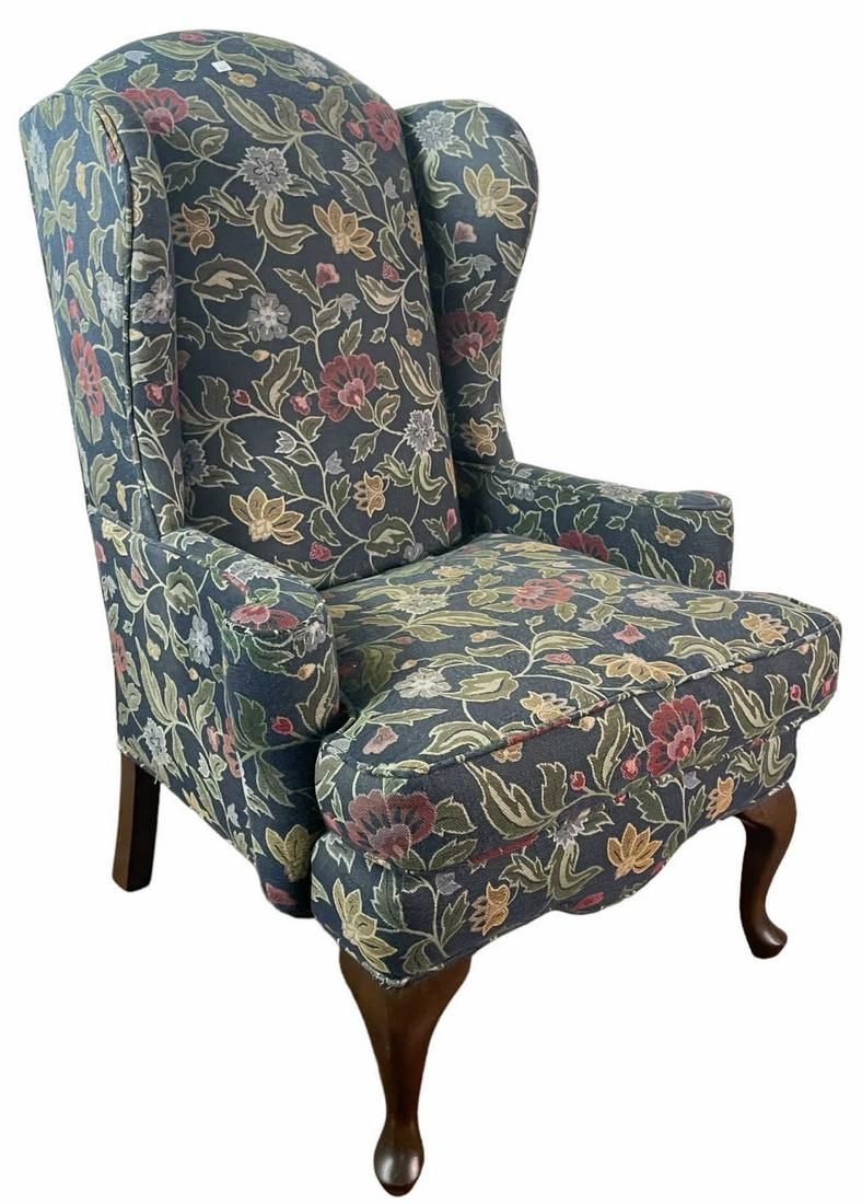 VINTAGE ENGLISH WINGBACK ARMCHAIR ON SPADE FEET: VINTAGE ENGLISH WINGBACK ARMCHAIR ON SPADE FEET. COMES WITH OTTOMAN NOT PICTURED Height: 45 in. by Width: 29.5 in. by Depth: 33 in.