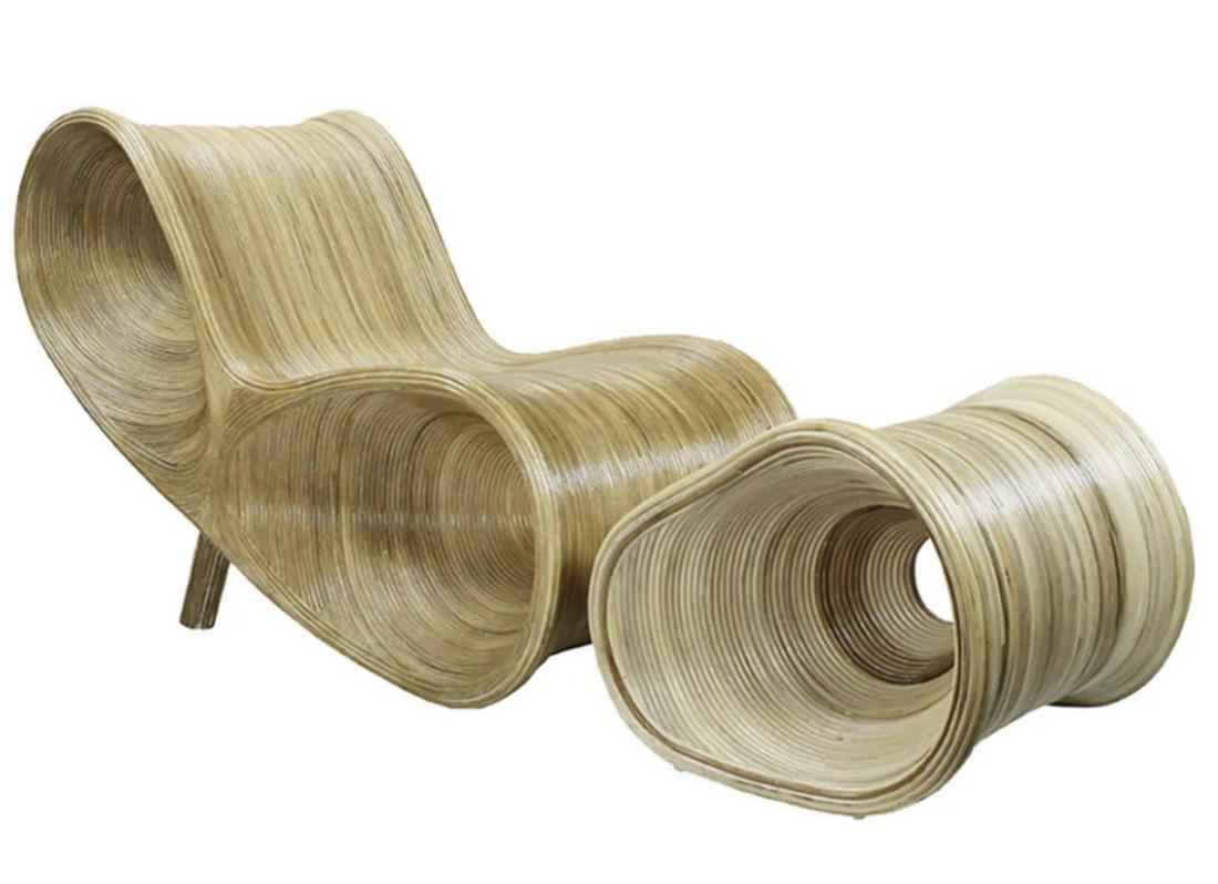 RATTAN PARABOLA CHAIR AND OTTOMAN: RATTAN PARABOLA CHAIR AND OTTOMAN. Height: 33 in. by Width: 52 in. by Depth: 23 in.
