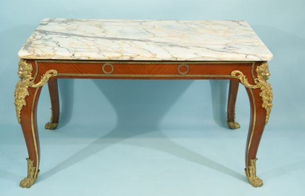 19th CENTURY FRENCH LOUIS XV-XVI SALON TABLE: 19th CENTURY FRENCH LOUIS XV-XVI MAHOGANY SALON TABLE WITH GILT BRONZE SABOTS DEPICTING CARYATIDES; SABOTS WITH A MARBLE TOP. Height: 28 1/2 in. by Width: 50 1/2 in. by Depth: 31 in.
