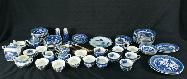 EIGHTY-TWO PIECES OF BLUE WILLOW DINNERWARE: EIGHTY-TWO PIECES OF BLUE WILLOW PORCELAIN DINNERWARE SET. Height: 1 and 1 in. by Width: 5 1/2 and 9 in.