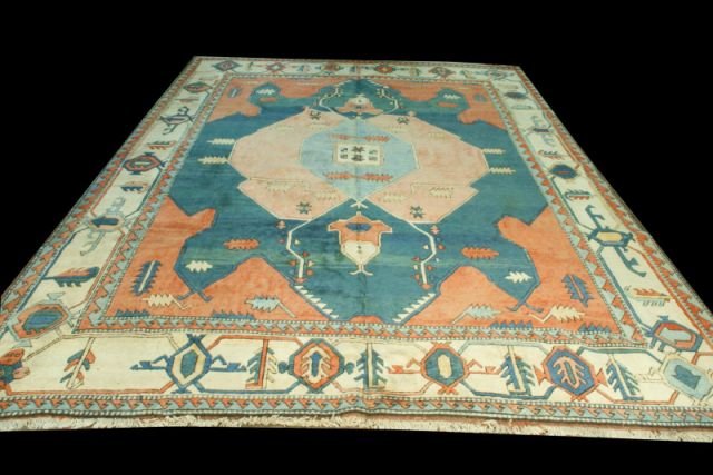 TURKISH MAIN RUG (BAKHSHAISH DESIGN), CIRCA 1950's: TURKISH MAIN RUG (BAKHSHAISH DESIGN). CIRCA 1950's. WOOL RUG IN BLUE, RUST & IVORY. Height: 13 ft. 5 in. by Width: 10 ft. 0 in.