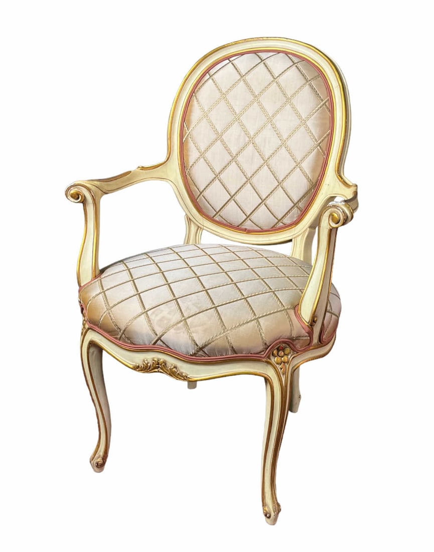 FRENCH CARVED ARMCHAIR IN ANTIQUE WHT & GOLD GILT: FRENCH CARVED ARMCHAIR IN ANTIQUE WHT & GOLD GILT Height: 38.75 in. by Width: 23.5 in. by Depth: 23.5
