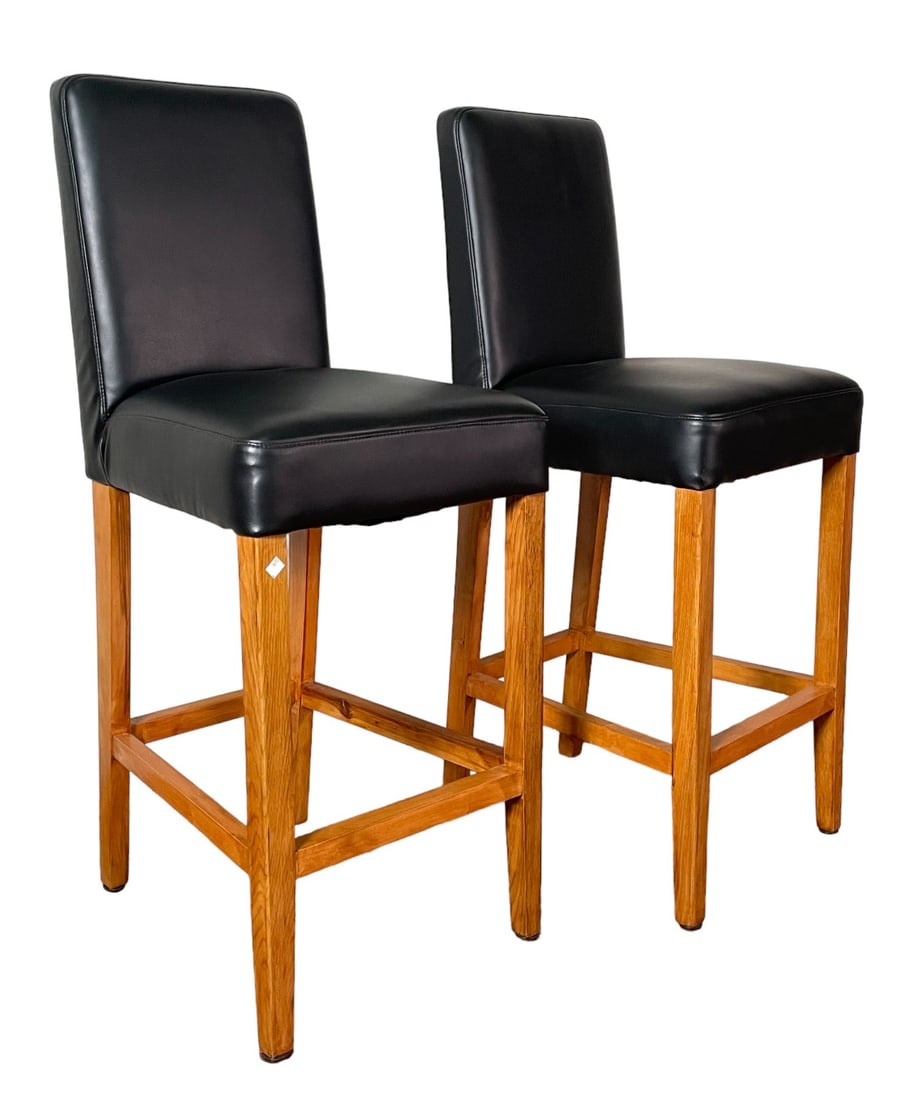 PAIR OF BLACK LEATHER BARSTOOLS: PAIR OF BLACK LEATHER BARSTOOLS Height: 45 in. by Width: 18 in. by Depth: 21.5