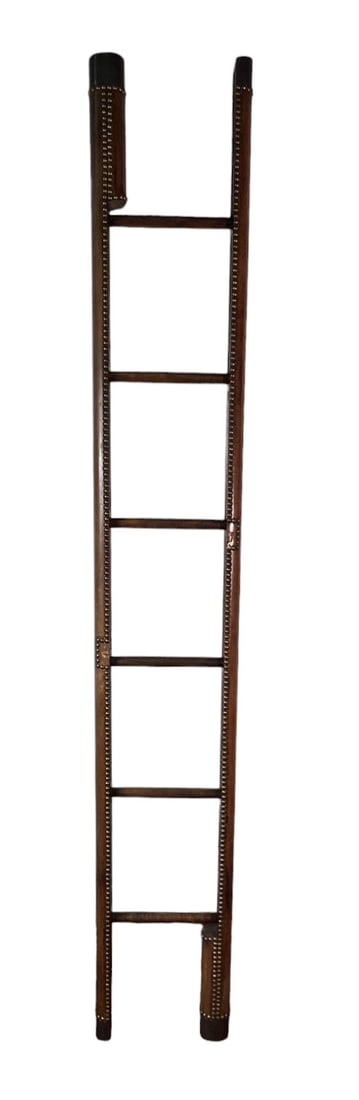 EARLY 1900's ENGLISH LIBRARY LADDER: EARLY 1900's ENGLISH LIBRARY FOLDING LADDER. COVERED IN TOOLED DARK LUGGAGE COLORED LEATHER AND BRASS NAILHEADS. Height: 90 in. by Width: 12 in. by Depth: 3 in.