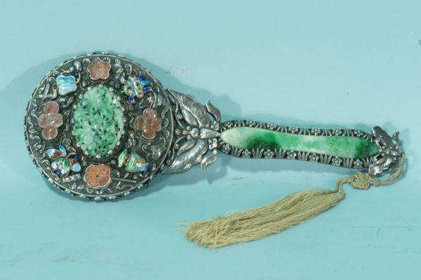 ANTIQUE CHINESE SILVER HAND MIRROR WITH JADE: ANTIQUE CHINESE SILVER HAND MIRROR WITH CARVED JADE AND ENAMEL DECORATION. Height: 9 in. by Width: 3 1/2 in. by Depth: 1 in.