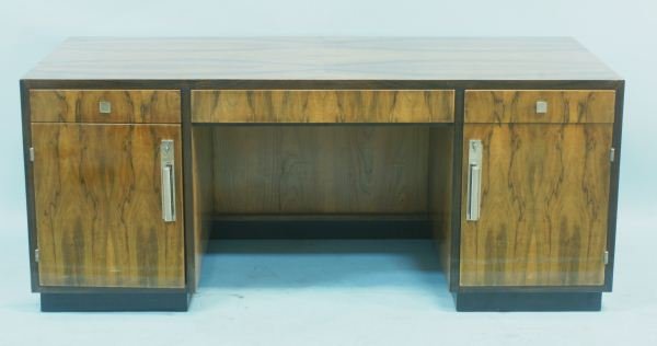 ART DECO DESK WITH FLAME CROTCH MAHOGANY PANELS: ART DECO DESK WITH FLAME CROTCH MAHOGANY BOOK MATCHED PANELS. Height: 30 in. by Width: 71 in. by Depth: 29 1/2 in.