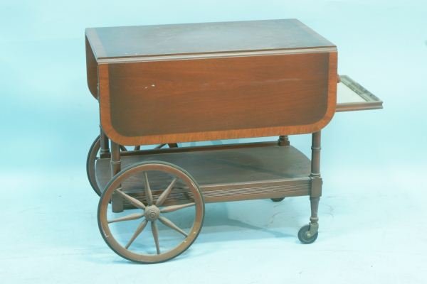 MAHOGANY TEA CART: MAHOGANY TEA CART ON WHEELS Height: 29 in. by Width: 42 in. by Depth: 32 in.