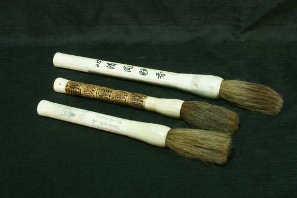 LOT OF THREE CALLIGRAPHY BRUSHES: LOT OF THREE CALLIGRAPHY BRUSHES Height: 18 in. by Width: 1 in.