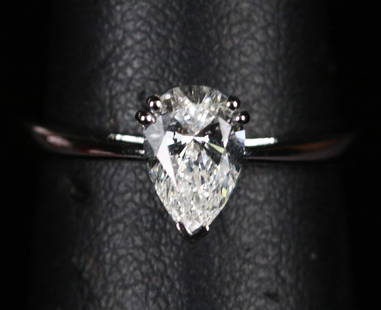 NEAR FLAWLESS PEAR CUT DIAMOND SOLITAIRE RING: NEAR FLAWLESS PEAR CUT DIAMOND SOLITAIRE RING 14 KT. WHITE GOLD SIZE 7 (172)