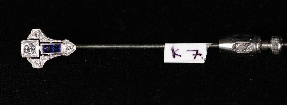 An ANTIQUE DIAMOND & SAPPHIRE platinum stickpin (1 of 2)