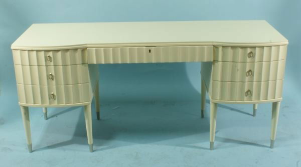 ART DECO STYLE DESK BY BARBARA BARRY FOR HENREDON: ART DECO STYLE DESK BY BARBARA BARRY FOR HENREDON IN IVORY PAINT. Height: 30 in. by Width: 67 in. by Depth: 22 in.