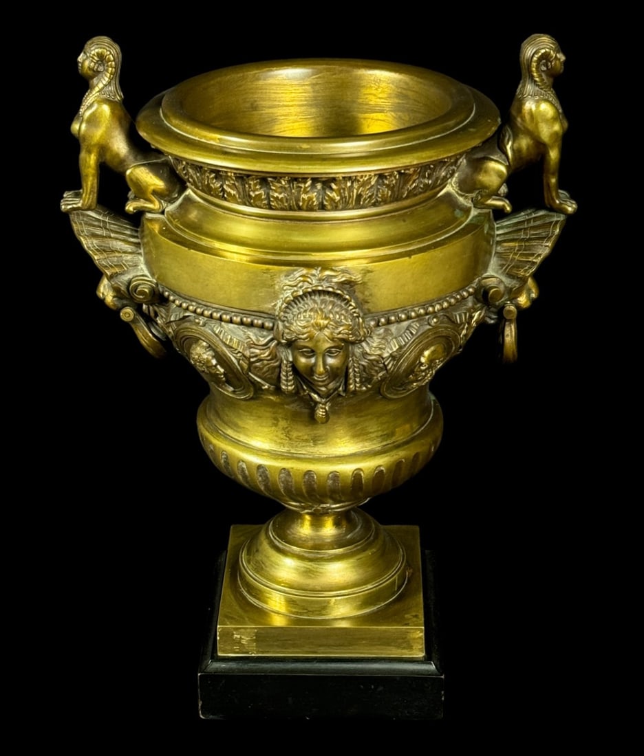 FRENCH GILT BRONZE MEDICI URN ON OBSIDIAN BASE: FRENCH GILT BRONZE MEDICI URN ON OBSIDIAN BASE. Height: 17 in. by Width: 12 in. by Depth: 10 in