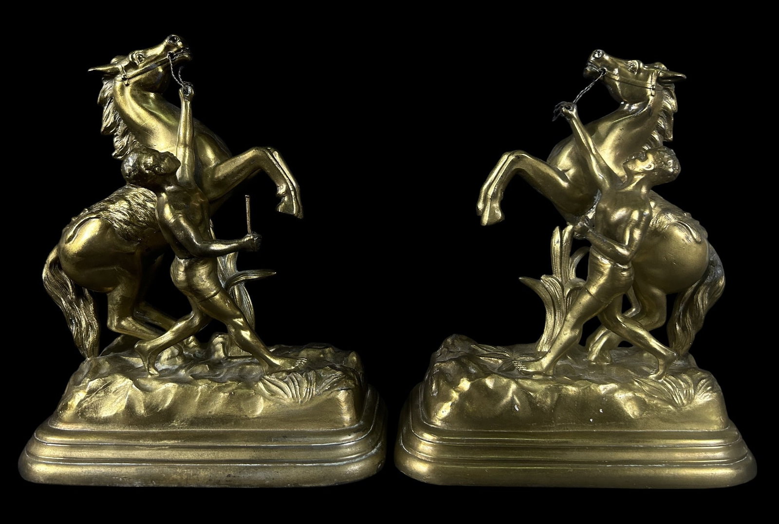 PAIR OF BRASS EQUESTRIAN SCULPTURES: PAIR OF BRASS EQUESTRIAN SCULPTURES. Height: 10.5 in. by Width: 8.5 in. by Depth: 4.25
