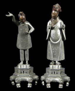 PAIR OF 18" TALL CHINESE PEWTER STATUES: PAIR OF 18" TALL CHINESE PEWTER STATUES WITH CARVED WOODEN FACES. Height: 18 in. by Width: 7 in. by Depth: 7 in.