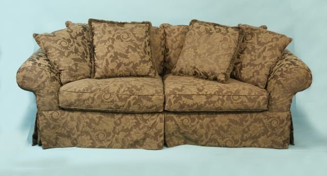 CUSTOM MADE TWO-CUSHION PILLOWBACK SOFA: CUSTOM MADE TWO-CUSHION PILLOWBACK SOFA IN COCOA DAMASK UPHOLSTERY. Height: 36 in. by Width: 90 in. by Depth: 37 in.