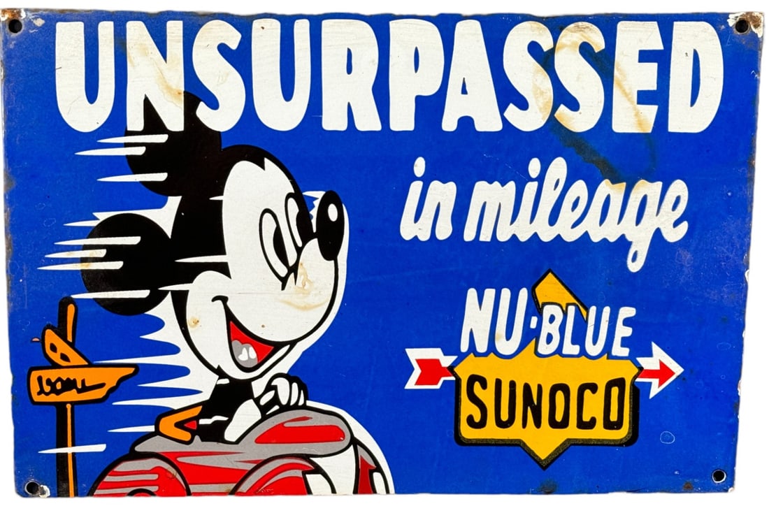 VINTAGE SUNOCO NU-BLUE PORCELAIN GAS SIGN: VINTAGE SUNOCO NU-BLUE PORCELAIN GAS SIGN WITH MICKEY MOUSE Height: 12 in. by Width: 24