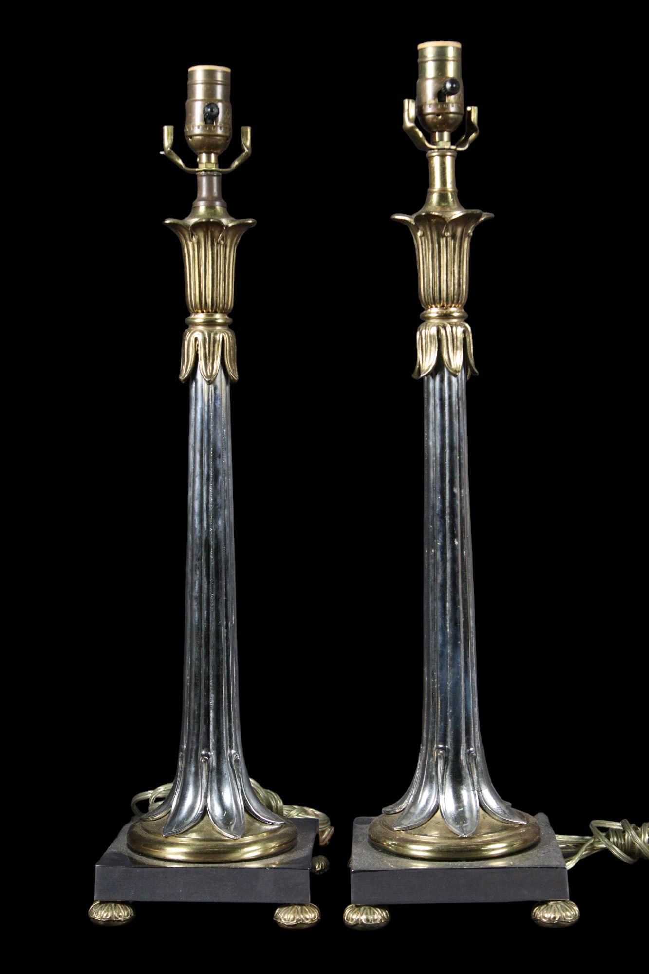 PAIR BRASS AND CHROME TYNDALE LAMPS: PAIR BRASS AND CHROME TYNDALE LAMPS. Height: 25 in. by Width: 6.5 in. by Depth: 6.5 in.