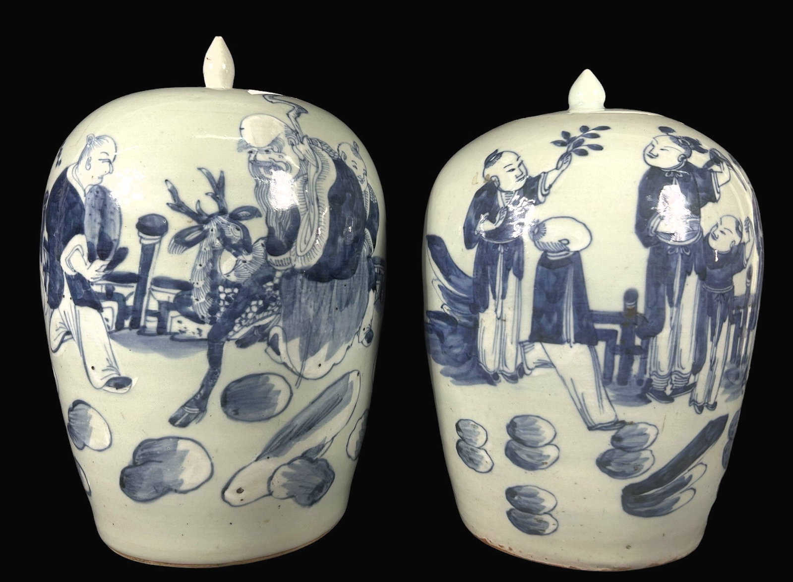 PAIR OF 19th CENTURY BLUE & WHITE TEMPLE JARS: PAIR OF 19th CENTURY BLUE & WHITE PORCELAIN LIDDED TEMPLE JARS. Height: 13 in. by Width: 7.5 in.