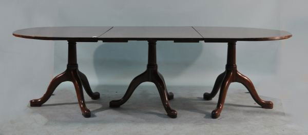 KITTINGER MAHOGANY DINING TABLE: KITTINGER TRIPLE PEDESTAL MAHOGANY DINING ROOM TABLE. Height: 29 in. by Width: 100 in. by Depth: 46 in.